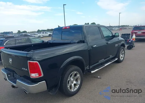 2015 Ram 1500 Laramie из США, поврежденный, VIN 1C6RR7NT7FS714057